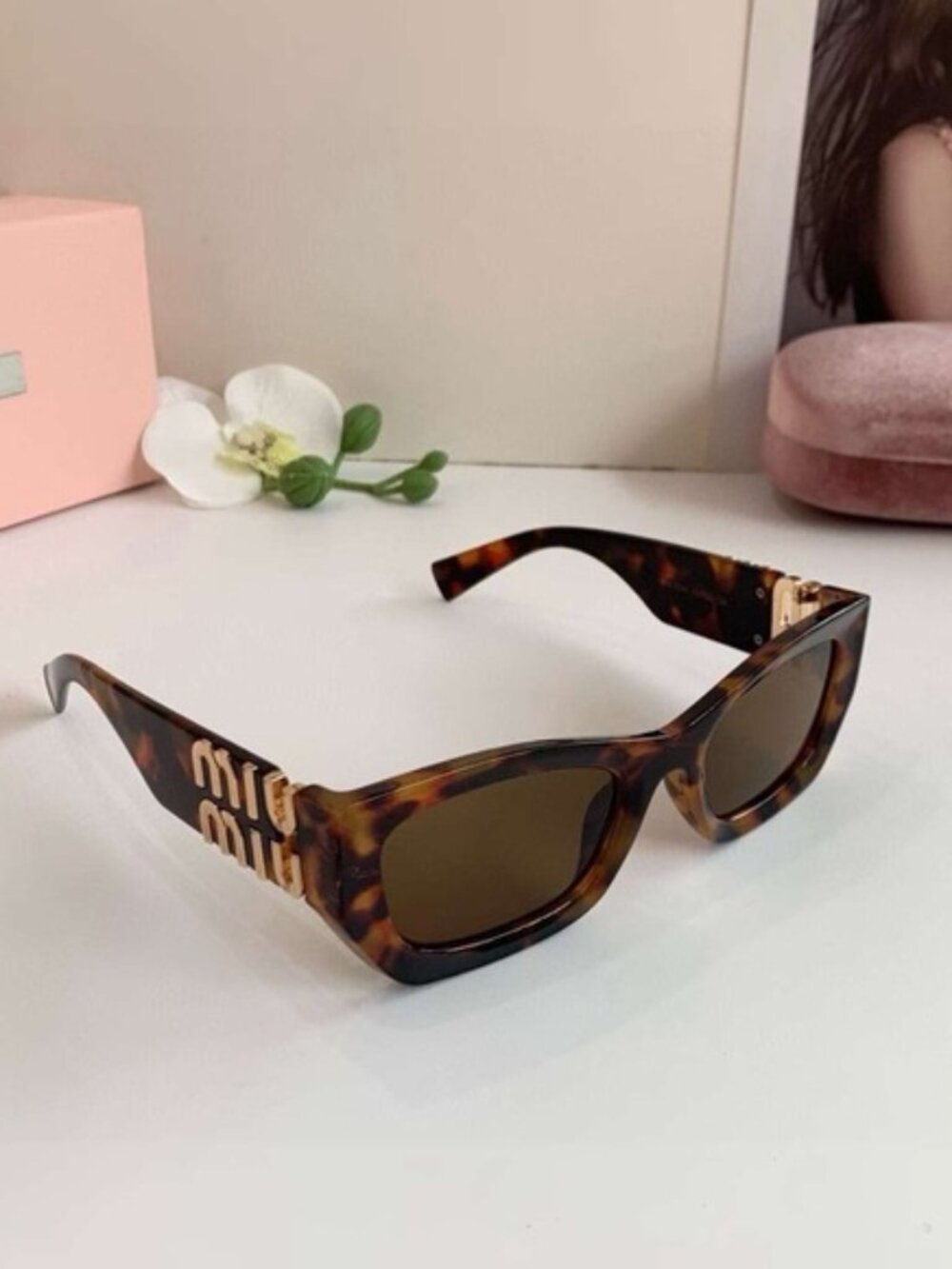 Miu Miu Havana Tortoise Shell Sunglasses with Gold Accents